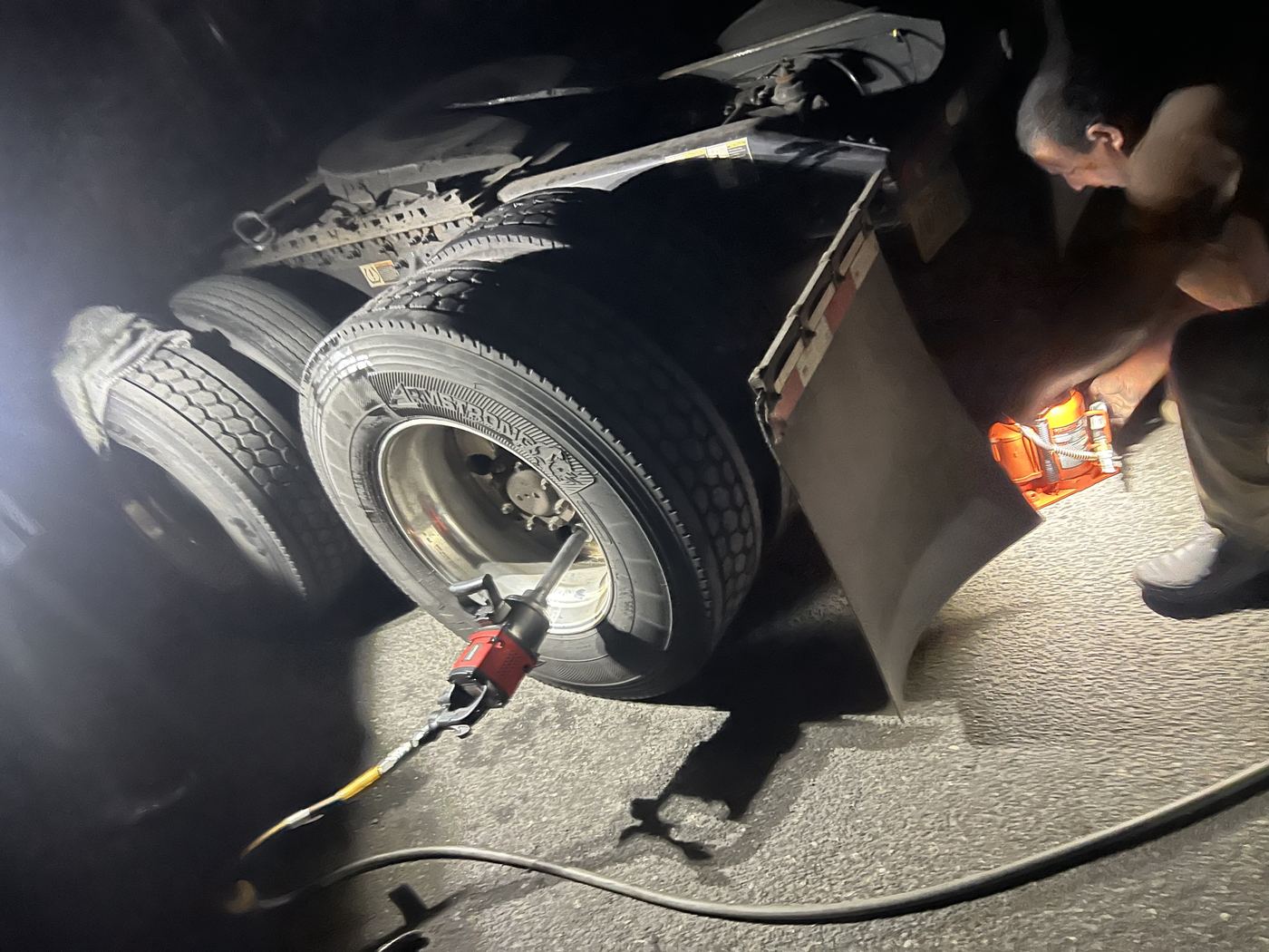 Roadside semi truck tire swap at night South Jersey NJ